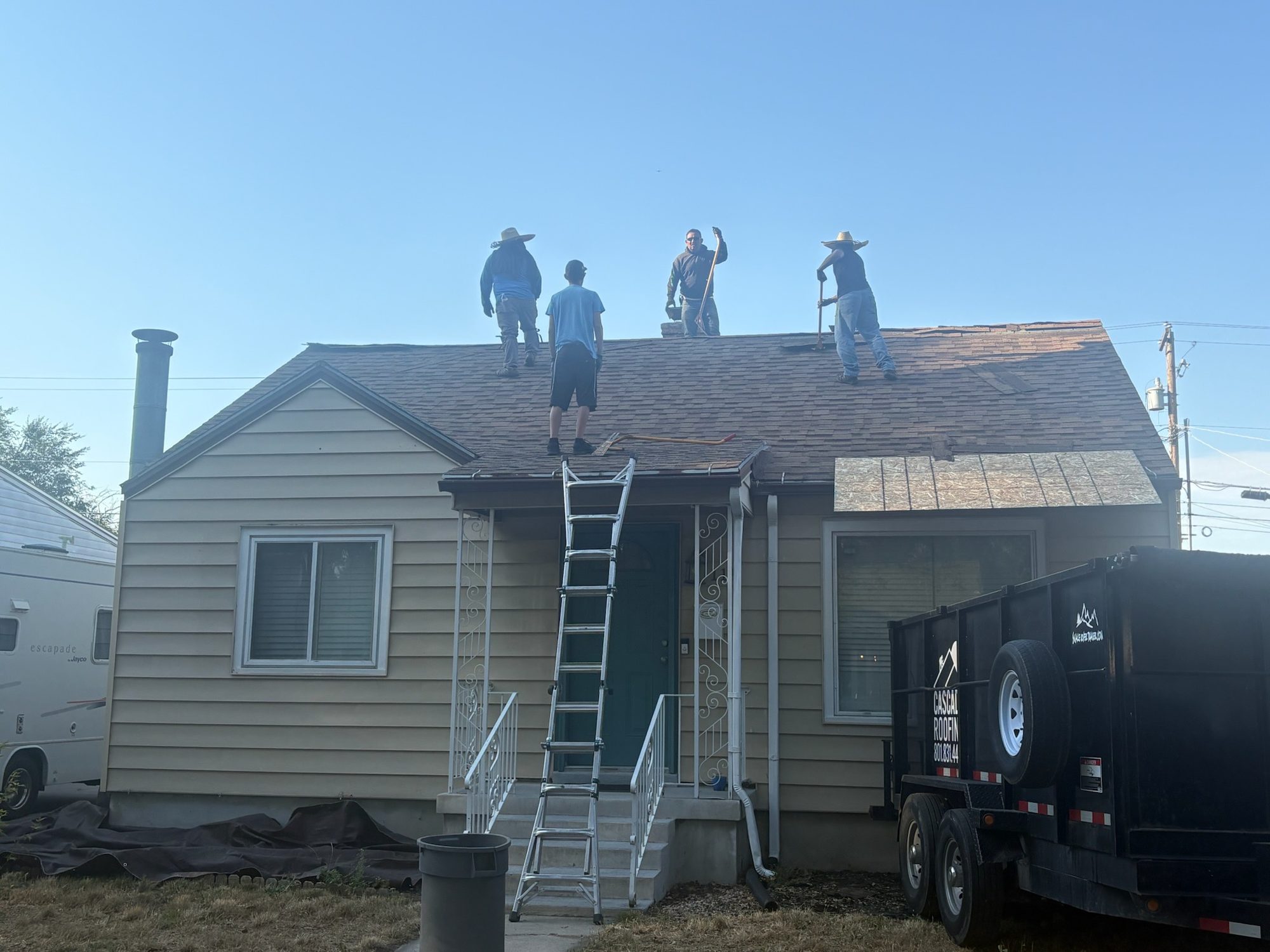 The old roof comes off